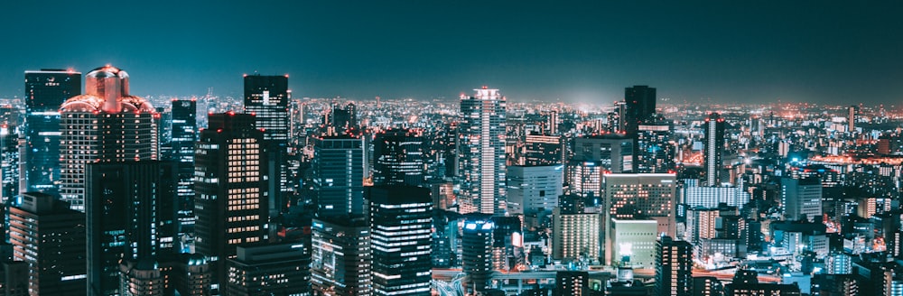 aerial photography of city buildings during nighttime