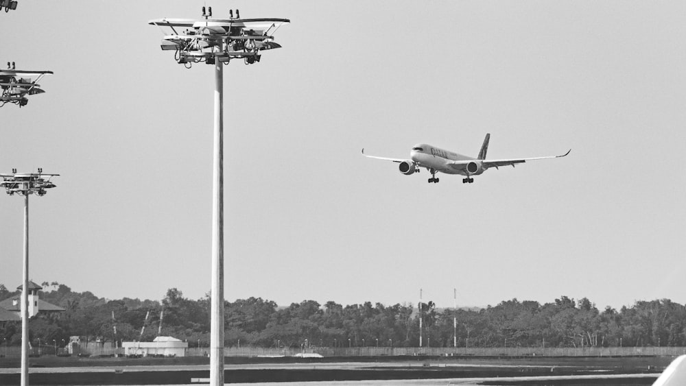 grayscale photography of airplane