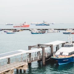 parked yacht beside dock