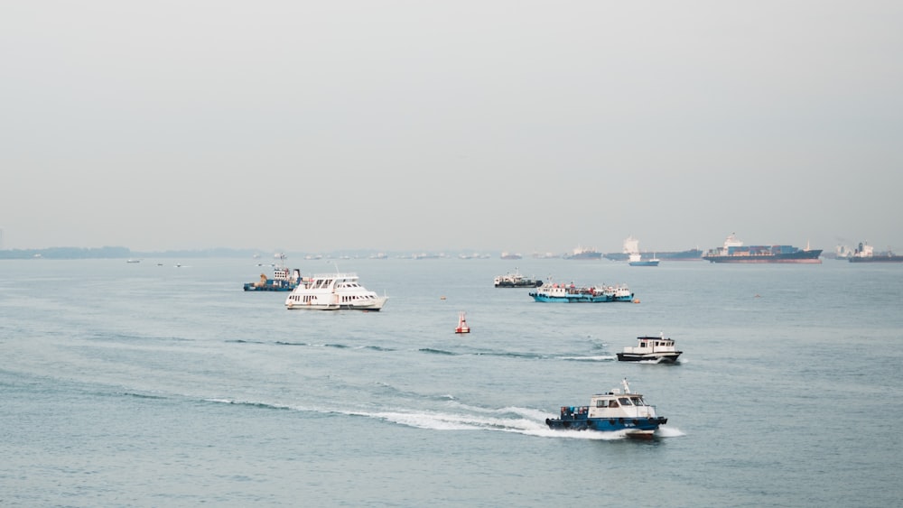 white speedboat on body of water