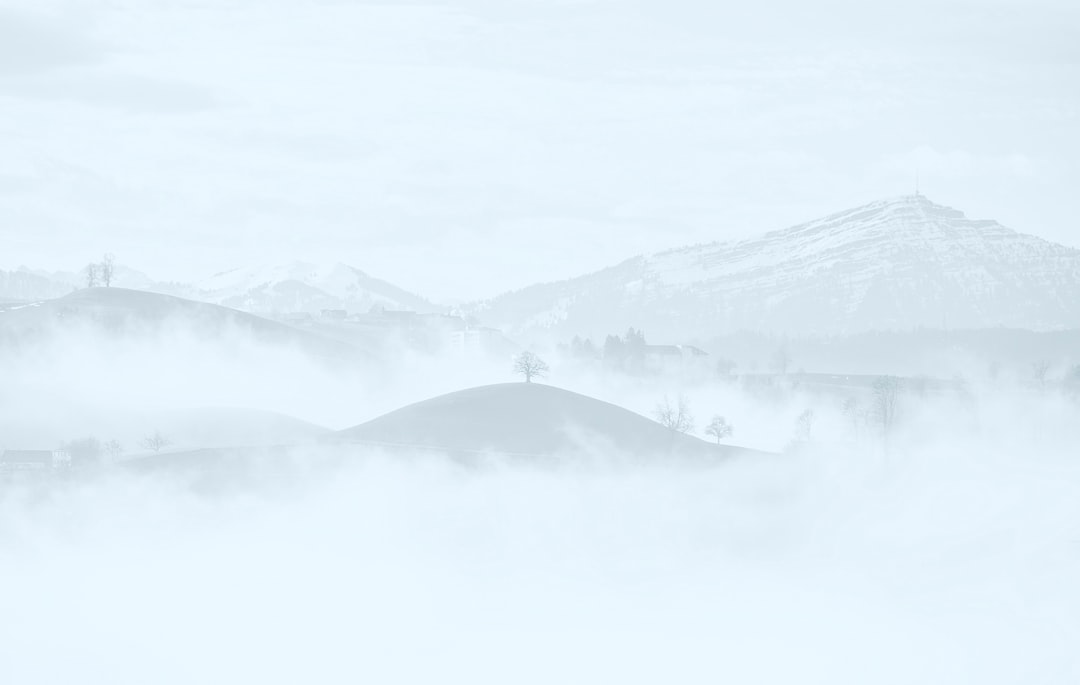 photo of mountains covered with snow