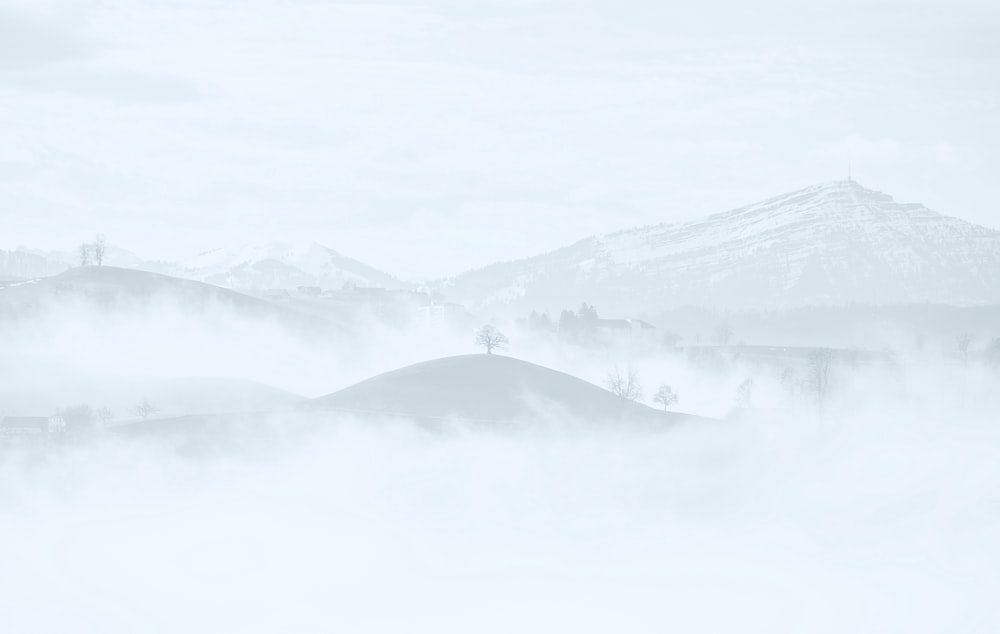 photo of mountains covered with snow