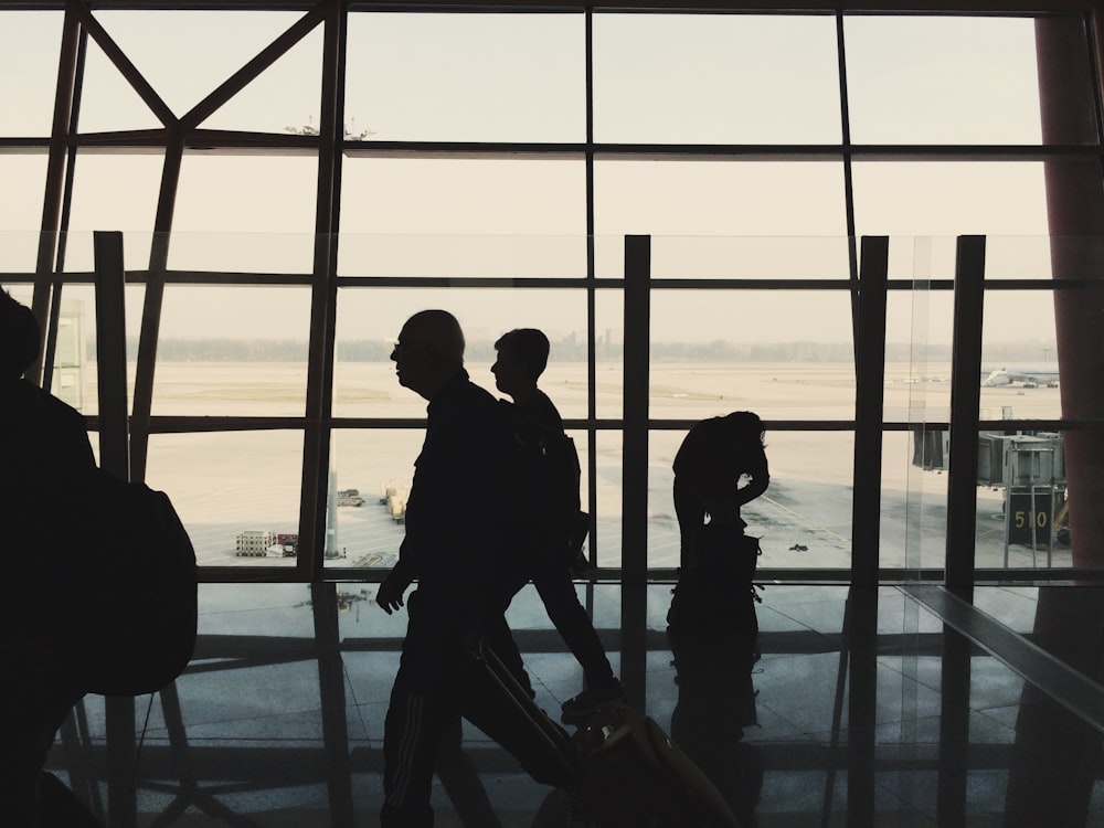 silhouette of people in the airport