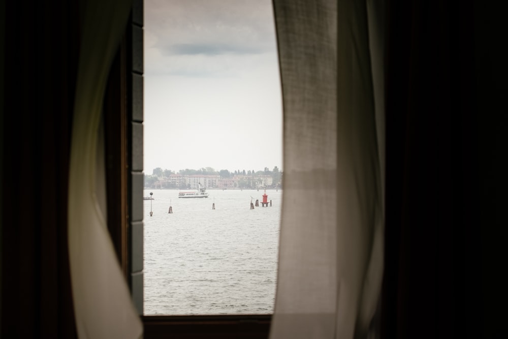 boat traveling during daytime