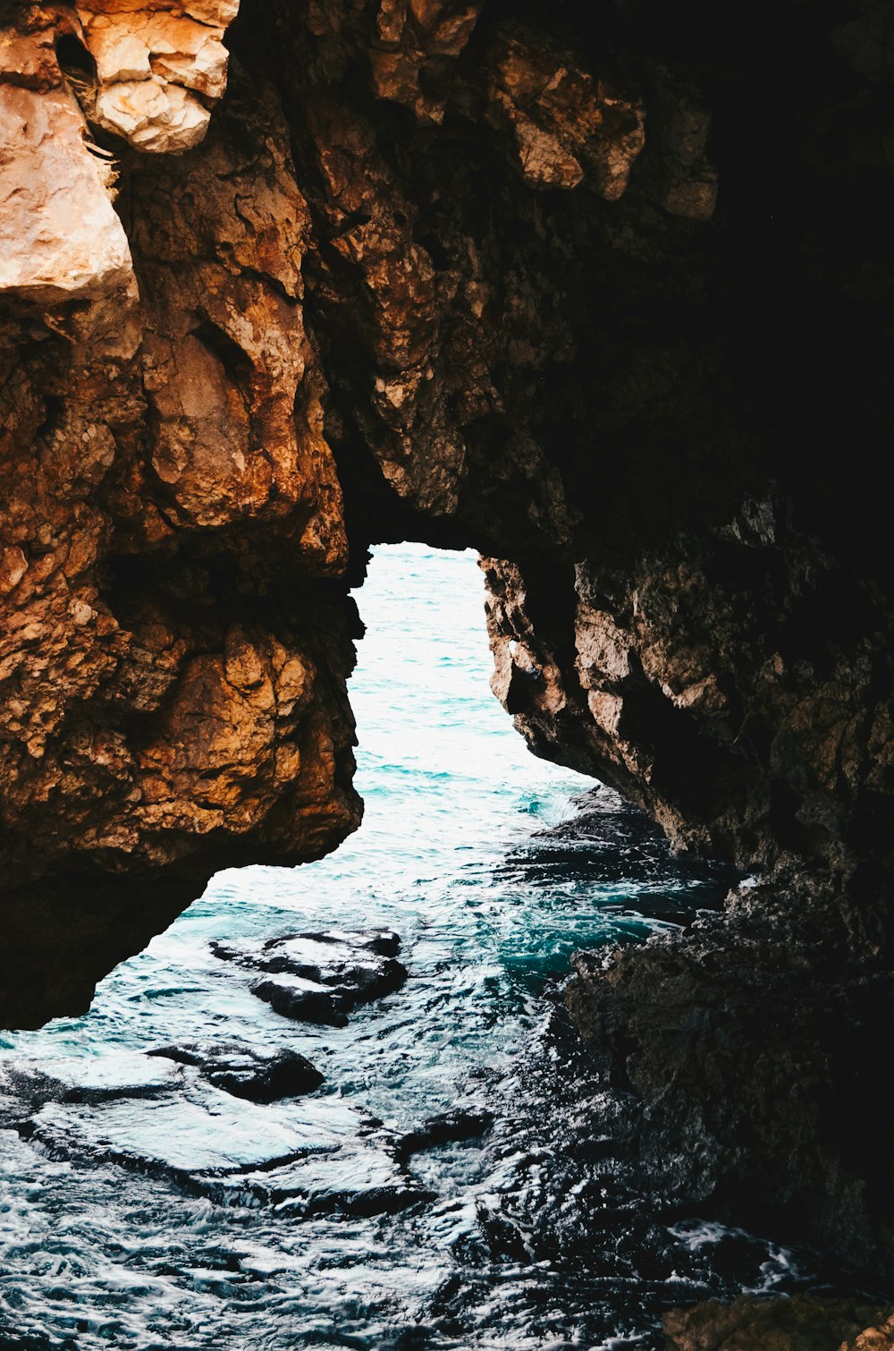 stone arch above water