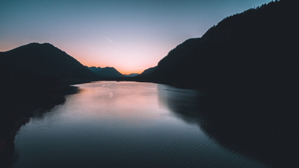 body of water between mountains