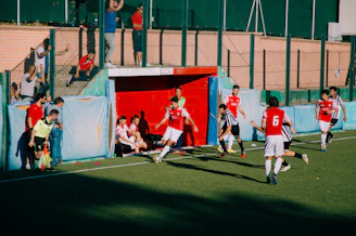 group of men playing soccer