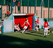 group of men playing soccer