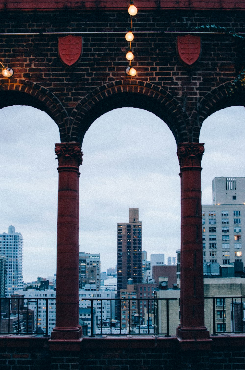 a view of a city from a covered area