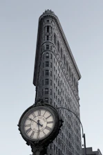 An elegant cityscape view of 521 5th Avenue, New York, highlighting the firm's prestigious headquarters.