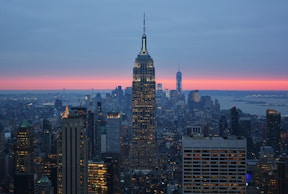 city buildings under cloud