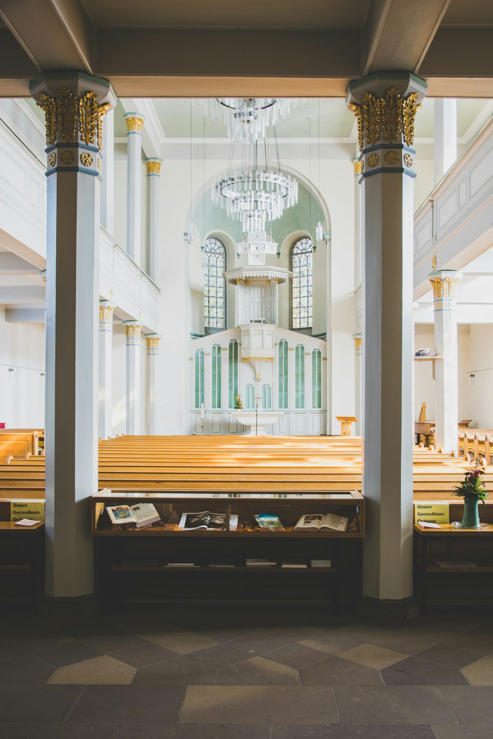 piled wooden pew bench in church