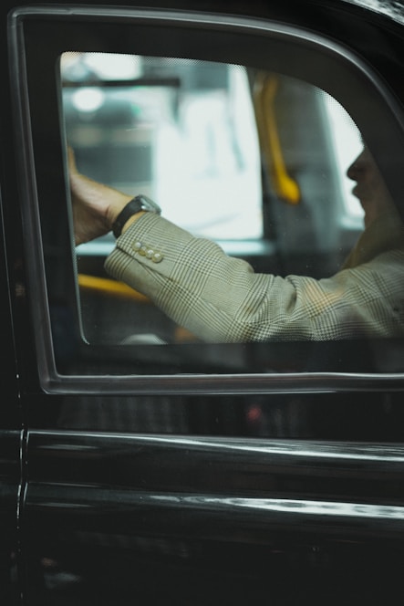 person sitting inside car