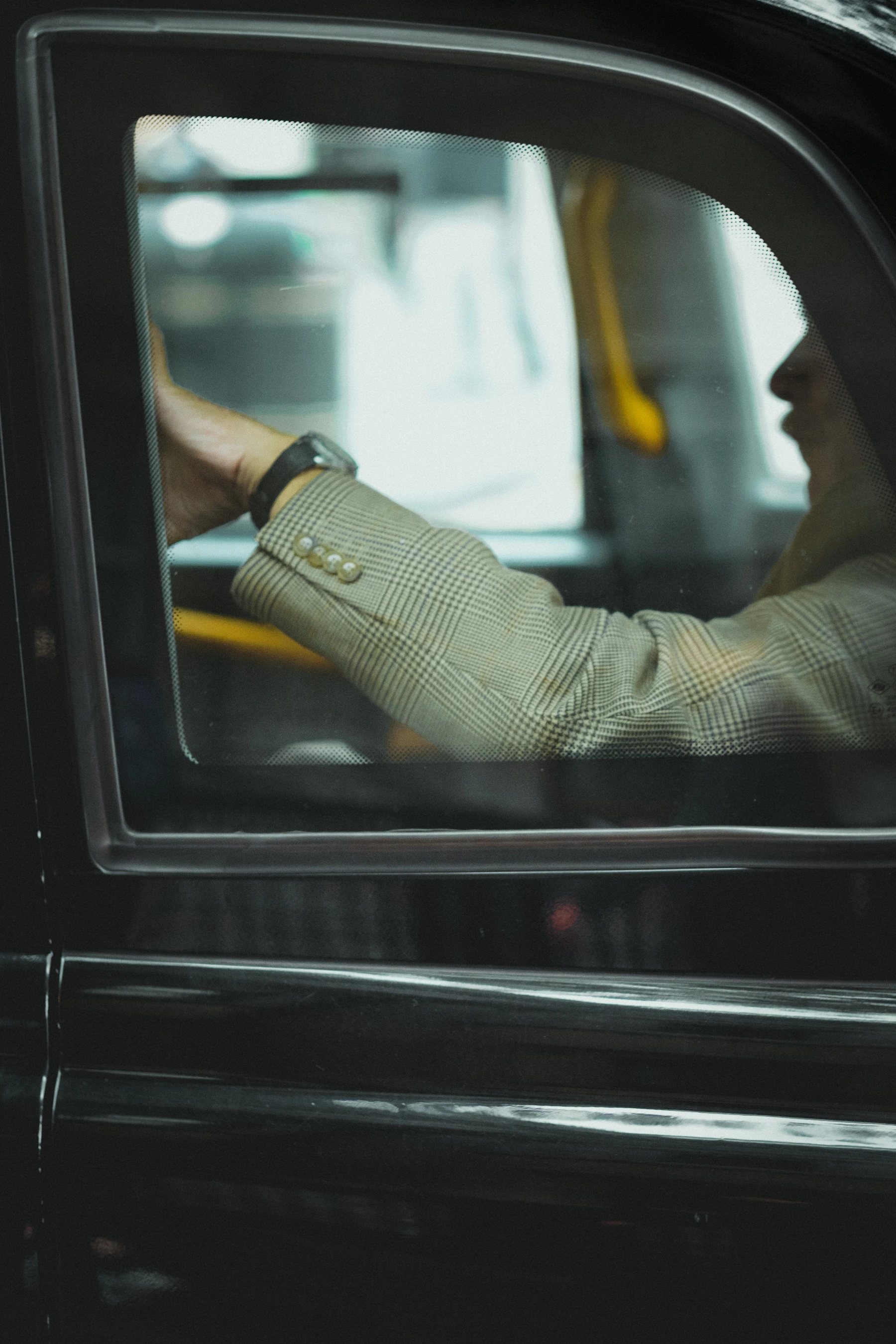 Passenger enjoying an everyday city taxi ride