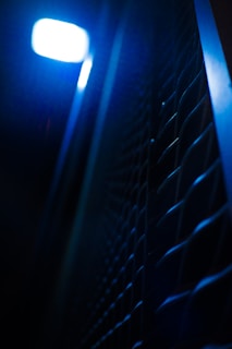 Close-up of the Flexprint Mousse showing its intricate 3D-printed lattice structure glowing under rugged off-road lighting.