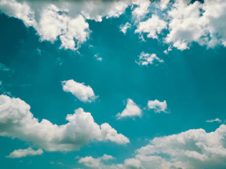 A vibrant screenshot of a user-friendly weather app showing clear skies and temperature.