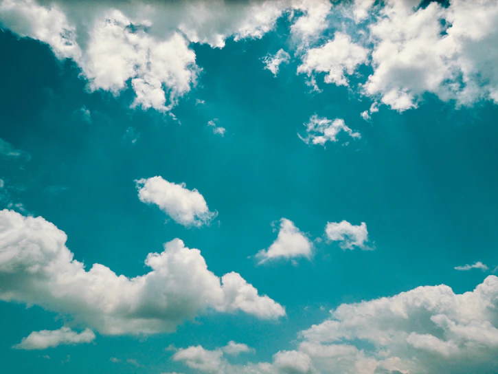 A vibrant screenshot of a user-friendly weather app showing clear skies and temperature.