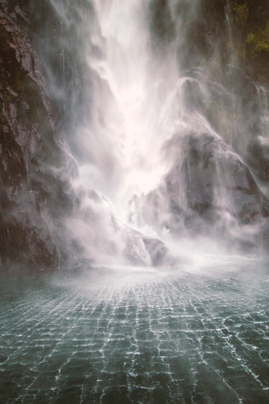 time lapse photo of falls in Milford Sound New Zealand