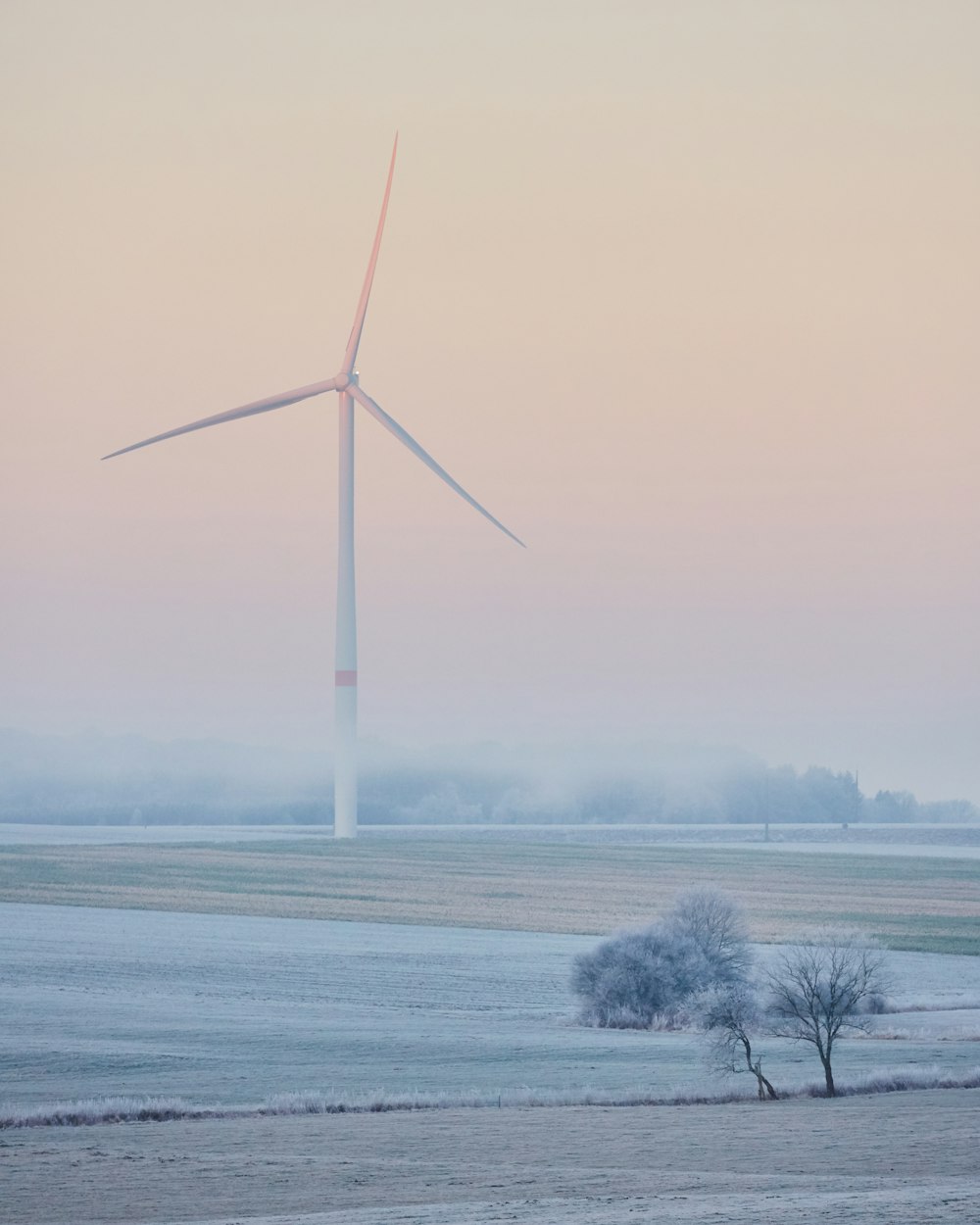 landscape photo of windmill on grass field