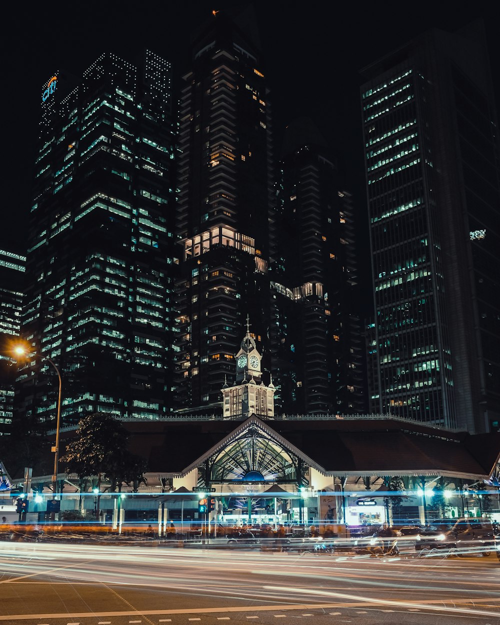 high-rise concrete building at night time