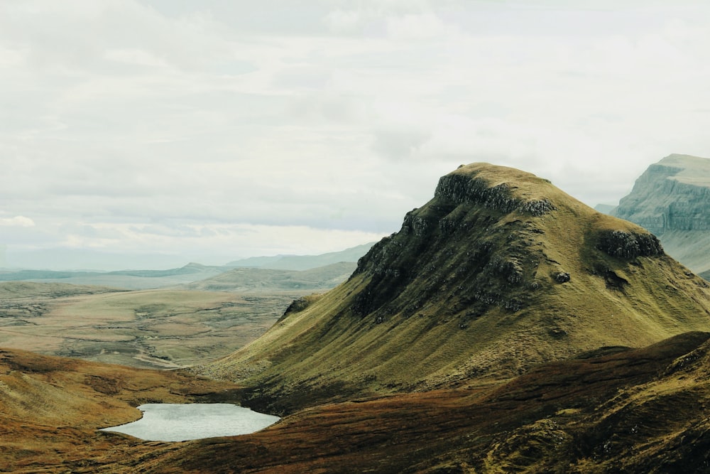 mountains next to lake