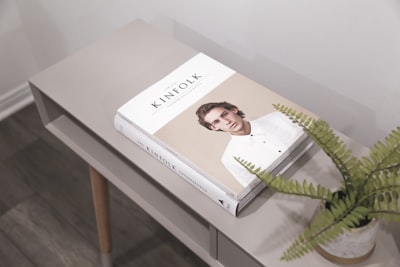 kinfolk smartphone book on gray wooden side table midcentury modern zoom background