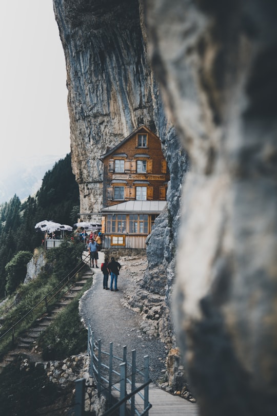 two men looking at the house in Gasthaus Aescher Switzerland