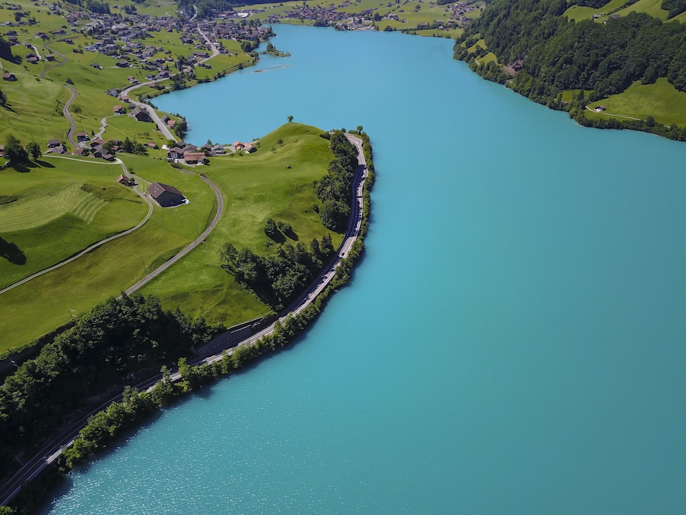 aerial photography of village near body of water