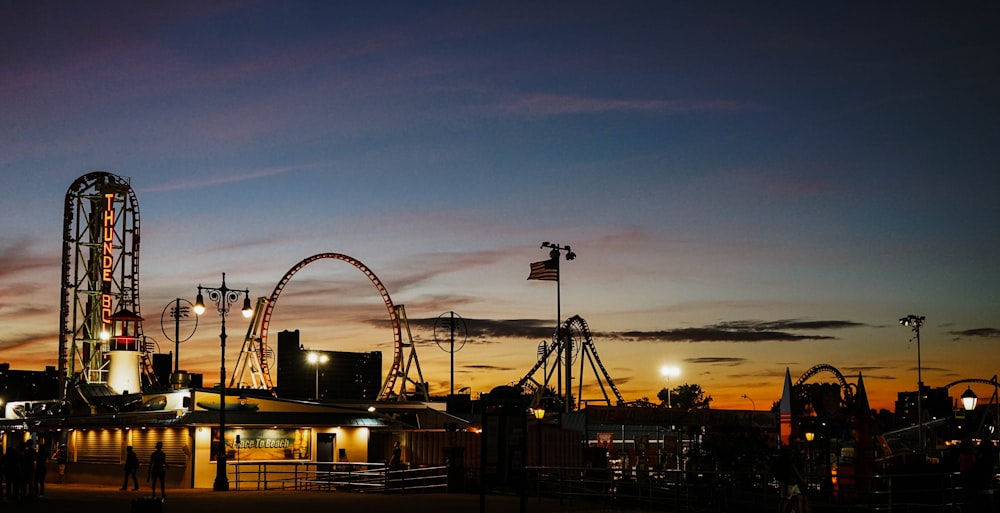 silhouette of carnival during golden hour