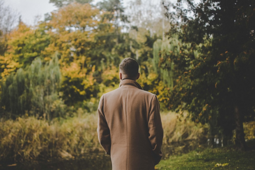 man standing in the forest