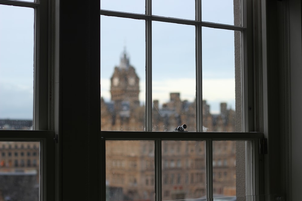 glass window pane facing Big Ben