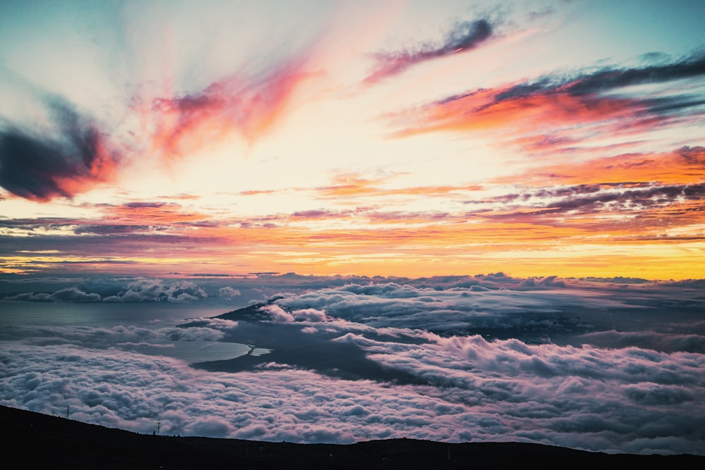 white clouds at golden hour