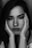 grayscale photography of woman with two hands on her face