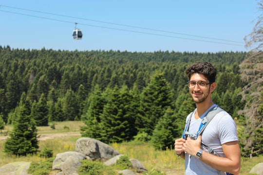 man standing near cable car during daytime in Uludağ Turkey