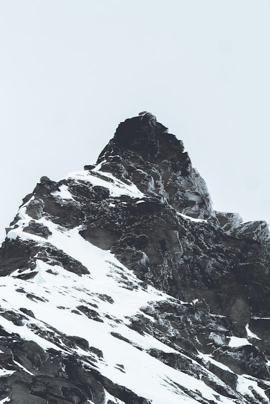 grayscale photo of a mountain in Mount Aspiring National Park New Zealand