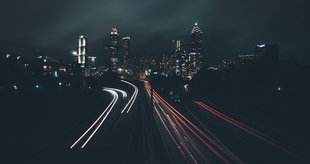 timelapse of road beside building