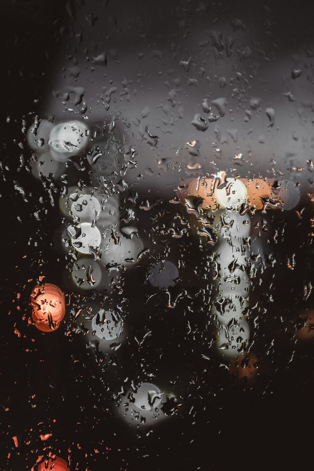 tilt shift view of rain drops