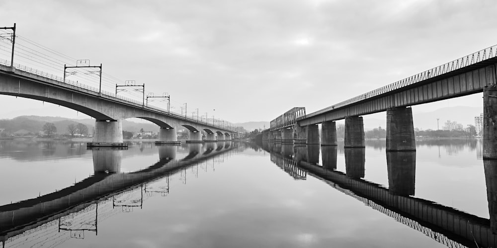 grayscale photography of concrete bridge