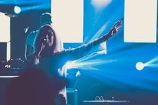 woman singing at stage