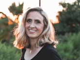 smiling woman in shallow focus photography