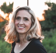 smiling woman in shallow focus photography