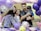 A family gathers closely, smiling and holding one another, surrounded by colorful balloons with paw print designs. The setting suggests a festive or celebratory occasion, possibly a birthday or special event.