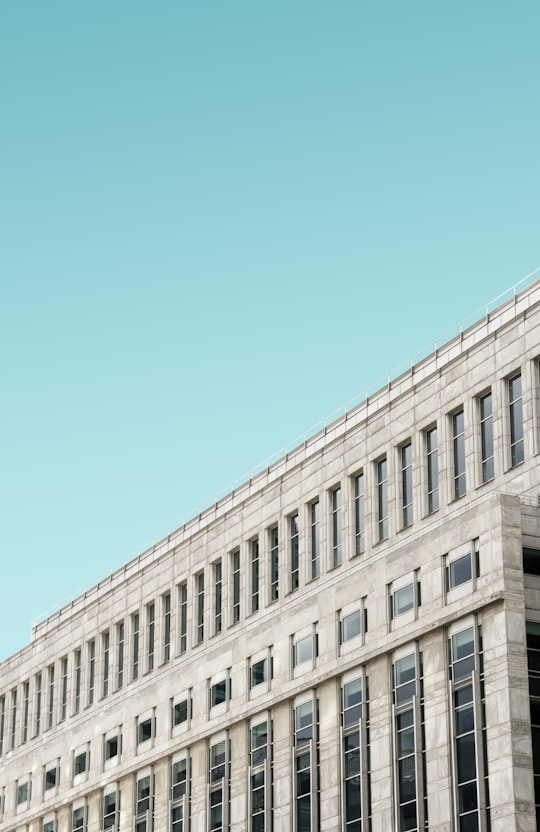 white painted building in landscape photography in Canary Wharf United Kingdom