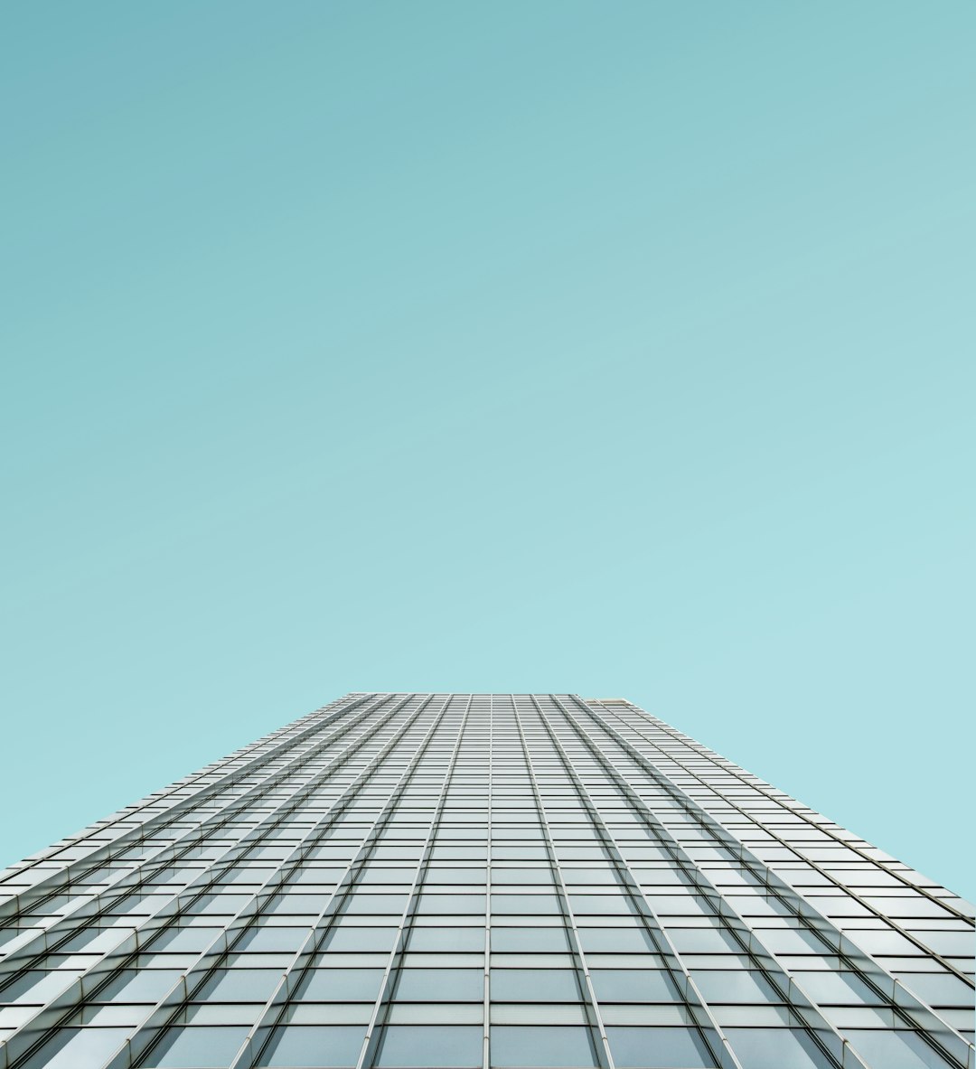 low angle photography of glass building