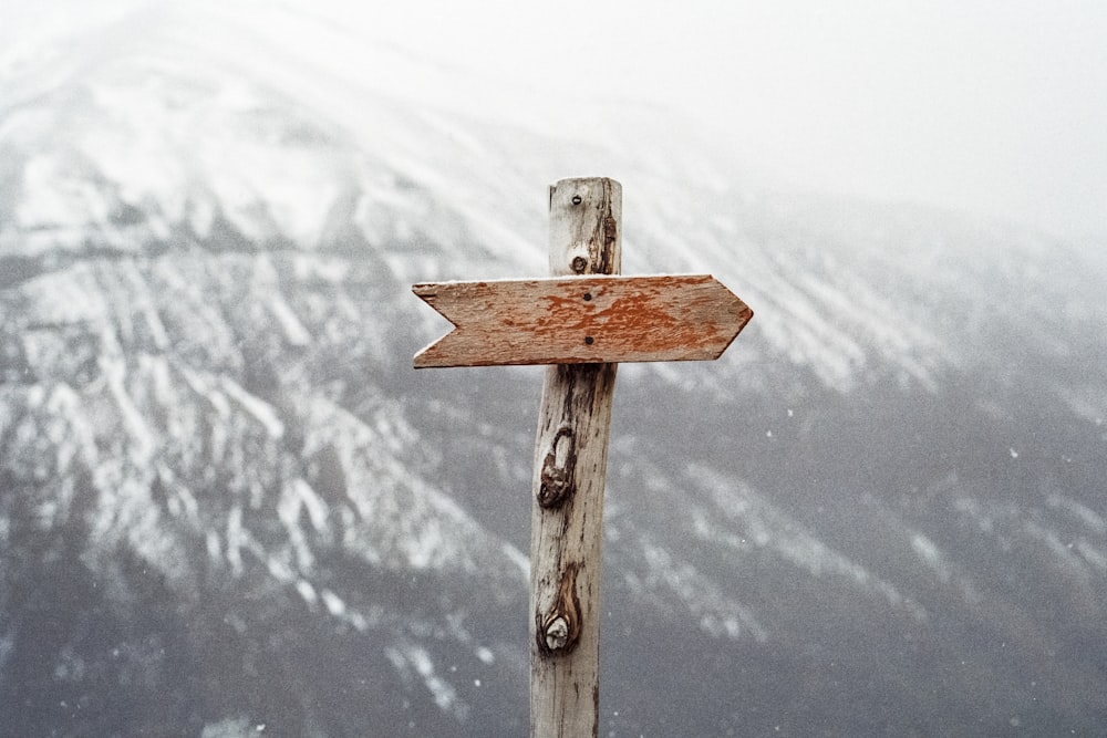 arrow sign on mountain