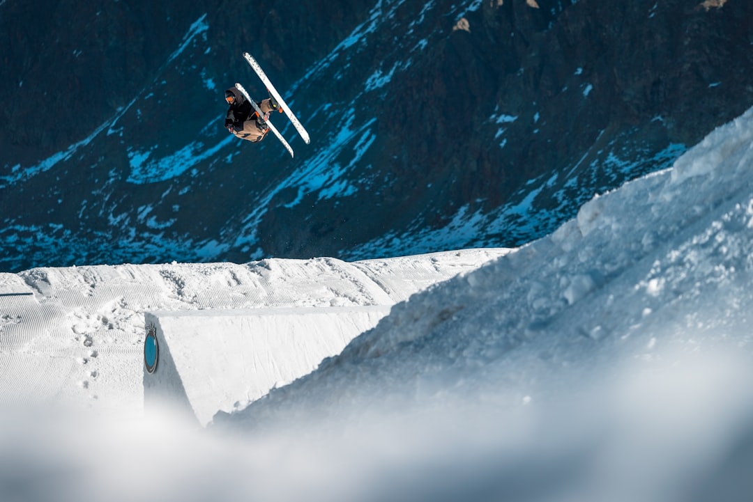 Freestyle skier doing a backflip in the mountains - Photo by Jörg Angeli / Unsplash | best digital marketing - London, Bristol and Bath marketing agency