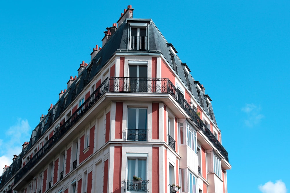 a very tall building with a clock on the top of it