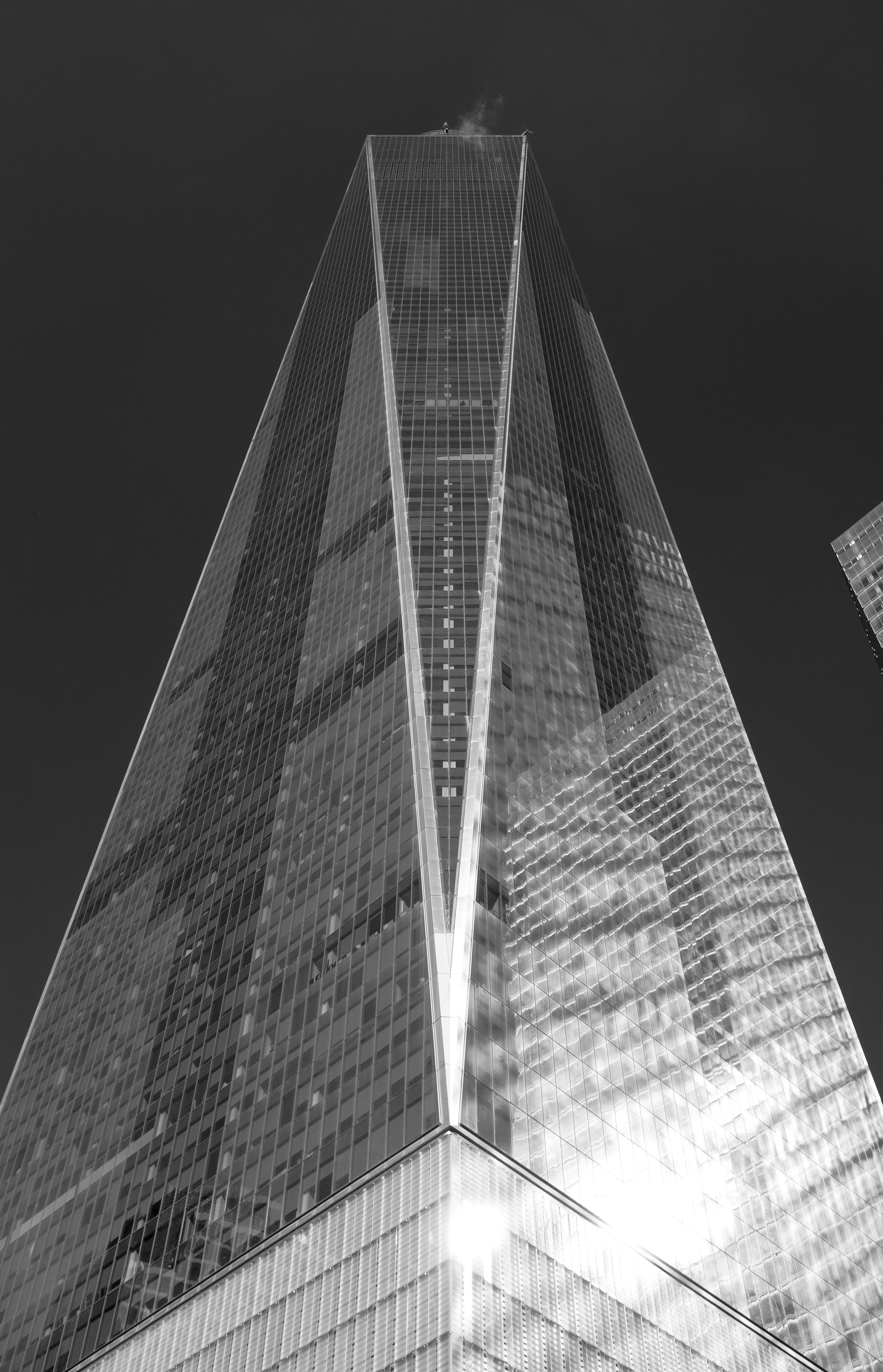 One of the coldest days I have ever experienced. Sunny, below freezing and the wind must have been blowing 50 mph through lower Manhattan. As we exited the 9/11 Memorial, I had to capture this image of the Freedom Tower, frozen in time.