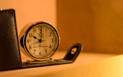 white and black table clock