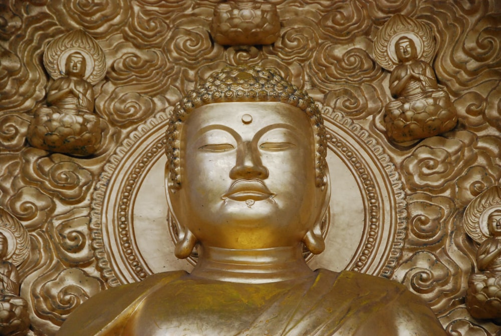 brown Gautama buddha statue